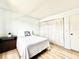 Serene bedroom with ample closet space, a cozy bed, and neutral tones that create a peaceful ambiance at 13926 Mission Oaks Blvd, Seminole, FL 33776