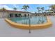 Beautiful community pool with clear water and inviting surroundings at 13926 Mission Oaks Blvd, Seminole, FL 33776