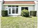 Charming home exterior with well-manicured shrubs and a neatly kept lawn at 13926 Mission Oaks Blvd, Seminole, FL 33776