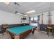 Entertaining game room with a well-maintained pool table and space for socializing and leisure at 13926 Mission Oaks Blvd, Seminole, FL 33776