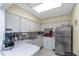 Functional kitchenette equipped with modern appliances, ample counter space and storage for convenience at 13926 Mission Oaks Blvd, Seminole, FL 33776