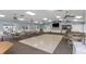 Spacious meeting room with ample seating, a dance floor and a kitchenette for gatherings and events at 13926 Mission Oaks Blvd, Seminole, FL 33776