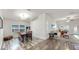 Open concept features living, dining, and great room with modern decor at 14224 Edinburgh Moor Dr, Wimauma, FL 33598