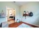 Multi-purpose room with open layout, hardwood floors, and versatile design at 14320 Tree Swallow Way, Lakewood Ranch, FL 34202