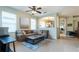Inviting living room with tile flooring, neutral paint, and ample natural light at 14320 Tree Swallow Way, Lakewood Ranch, FL 34202