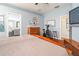 Bright main bedroom with an en-suite bathroom and wood-style flooring, a relaxing retreat at 14320 Tree Swallow Way, Lakewood Ranch, FL 34202