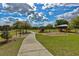 Community playground with swings and slides, offering recreational activities for families at 14320 Tree Swallow Way, Lakewood Ranch, FL 34202