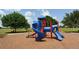 Colorful blue playground equipment offers slides, climbing areas, and fun activities at 14320 Tree Swallow Way, Lakewood Ranch, FL 34202