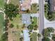 A beautiful home featuring a large lot surrounded by mature trees and meticulous landscaping at 167 Almedo Ne Way, St Petersburg, FL 33704