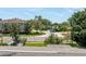 Charming neighborhood street view with well-maintained homes and lush landscaping at 167 Almedo Ne Way, St Petersburg, FL 33704