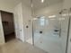 Modern bathroom with glass shower enclosure and tiled bench at 17304 Scuba Crest St, Wimauma, FL 33598