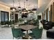 A sophisticated dining area with trendy furniture, elegant lighting, and stylish decor, ideal for upscale community gatherings at 17304 Scuba Crest St, Wimauma, FL 33598