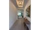 Bright entryway with decor leading to open living area, lots of light and space at 17304 Scuba Crest St, Wimauma, FL 33598