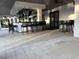 A trendy outdoor bar featuring stylish seating, contemporary design, and inviting ambiance for community gatherings at 17304 Scuba Crest St, Wimauma, FL 33598