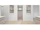 Luxurious bathroom with separate vanities and spacious walk-in shower at 17802 Mission Oak Dr, Lithia, FL 33547