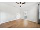 Spacious bedroom with wood floors and ensuite bathroom at 17802 Mission Oak Dr, Lithia, FL 33547