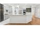 Bright kitchen with a large island and stainless steel appliances at 17802 Mission Oak Dr, Lithia, FL 33547