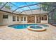 Screened in backyard pool and spa at 17802 Mission Oak Dr, Lithia, FL 33547