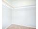 Walk in closet with neutral color and carpet flooring at 1799 N Highland Ave # 185, Clearwater, FL 33755