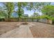 Spacious backyard featuring a fire pit, perfect for outdoor gatherings at 2204 E Idlewild Ave, Tampa, FL 33610