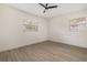 Cozy bedroom with ample natural light and neutral paint, new floors at 2204 E Idlewild Ave, Tampa, FL 33610