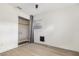 Bright bedroom features wood-look floors, a window, and a closet with gray curtain at 2204 E Idlewild Ave, Tampa, FL 33610