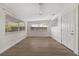 Versatile bonus room with neutral walls, new floors, and lots of windows at 2204 E Idlewild Ave, Tampa, FL 33610