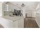 Modern kitchen with stainless steel appliances and quartz countertops at 2204 E Idlewild Ave, Tampa, FL 33610