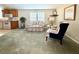 Inviting living space with a blend of seating options and seamless transitions to the kitchen at 250 S Port Royal Ln, Apollo Beach, FL 33572