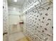 A practical walk-in closet with metal shelving offering ample storage space and organization at 250 S Port Royal Ln, Apollo Beach, FL 33572