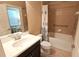 Accessible bathroom features a combination tub and shower with safety grab bars at 2527 Terracina Dr, Venice, FL 34292