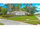 View of the Verona Reserve community sign with lush green landscaping and a clear blue sky at 2527 Terracina Dr, Venice, FL 34292