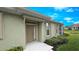 Charming front entrance with a well-maintained lawn and storm shutters at 2527 Terracina Dr, Venice, FL 34292