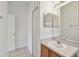 Bathroom featuring a mirrored medicine cabinet and modern vanity at 2609 Rosehaven Dr, Wesley Chapel, FL 33544