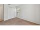 Bedroom with carpeted floors and closet at 2609 Rosehaven Dr, Wesley Chapel, FL 33544