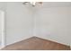 Carpeted bedroom with neutral colors and fan overhead at 2609 Rosehaven Dr, Wesley Chapel, FL 33544