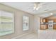 Cozy dining area featuring neutral paint, tile floors and an open concept layout into the kitchen at 2609 Rosehaven Dr, Wesley Chapel, FL 33544