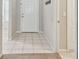 Tile entryway features a coat rack and leads to the main living areas of the home at 2609 Rosehaven Dr, Wesley Chapel, FL 33544