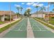 Enjoy a game of shuffleboard on these outdoor courts at 2699 Pine Ridge E Way # H2, Palm Harbor, FL 34684