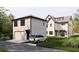 Modern home with an attached garage, featuring a private driveway and well-maintained landscaping at 2719 13Th N St, St Petersburg, FL 33704