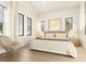 Bright bedroom featuring large windows, neutral decor, and hardwood floors at 2719 13Th N St, St Petersburg, FL 33704