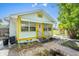 Quaint single-Gathering home featuring a sunny exterior, complemented by a brick pathway and well-maintained landscaping at 3108 56Th S St, Gulfport, FL 33707