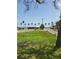 An idyllic beach setting with blue skies and palm trees in a great community at 3108 56Th S St, Gulfport, FL 33707
