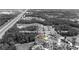 Aerial view showing home's location in Wesley Chapel, FL, surrounded by lush greenery and community at 3148 Watermark Dr, Wesley Chapel, FL 33544