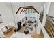 Aerial view of an open-concept home with a large living room and dining area at 3148 Watermark Dr, Wesley Chapel, FL 33544
