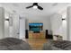 Comfortable living room featuring a large tv with surround sound, bean bag chairs, and accent lighting at 3148 Watermark Dr, Wesley Chapel, FL 33544