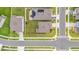 Aerial view of the property showing its location on a corner lot with well manicured lawn at 32136 Conchshell Sail St, Wesley Chapel, FL 33545