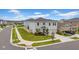 Spacious two-story home in a suburban neighborhood, featuring well-maintained landscaping and a two-car garage at 32136 Conchshell Sail St, Wesley Chapel, FL 33545