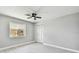 Bedroom featuring a ceiling fan and bright, neutral walls at 325 Gladstone Blvd, Englewood, FL 34223