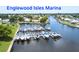 Scenic marina with numerous boats docked, offering stunning waterfront views at 325 Gladstone Blvd, Englewood, FL 34223